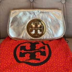 Tory Burch gold clutch